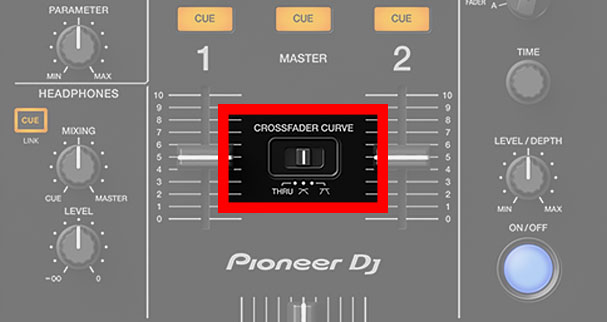 The crossfader curve adjustment switch in the middle of the XDJ-RX3 mixer section.