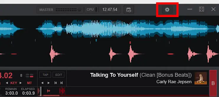 First, enter the Virtual DJ settings menu by clicking the cog button in the top right of the main VDJ screen.