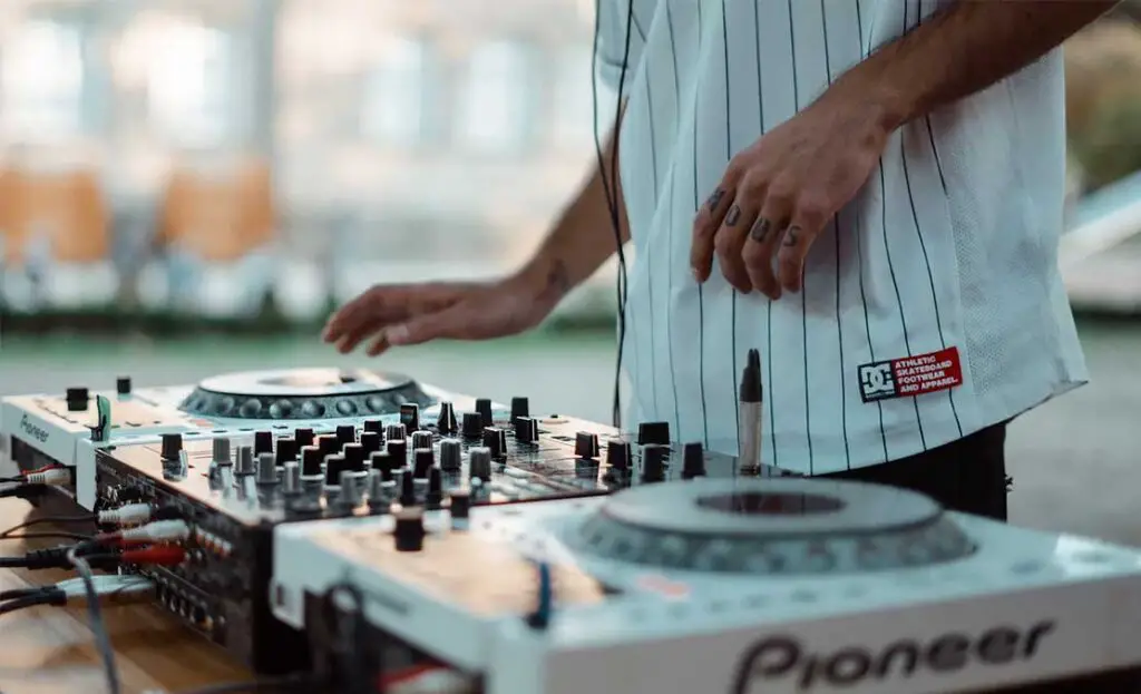 So, should you get a pair of CDJs and a mixer, or a simple DJ controller?